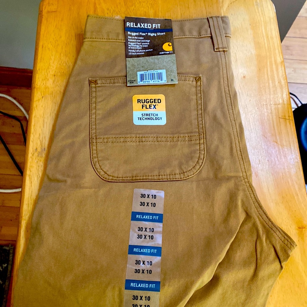 Two pairs Carharttt shorts. New with tags.